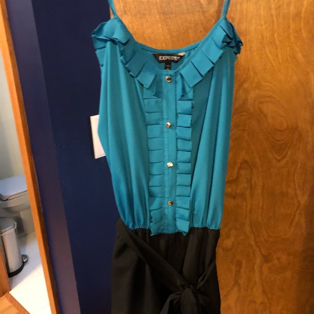 Express romper. Never worn. Medium.